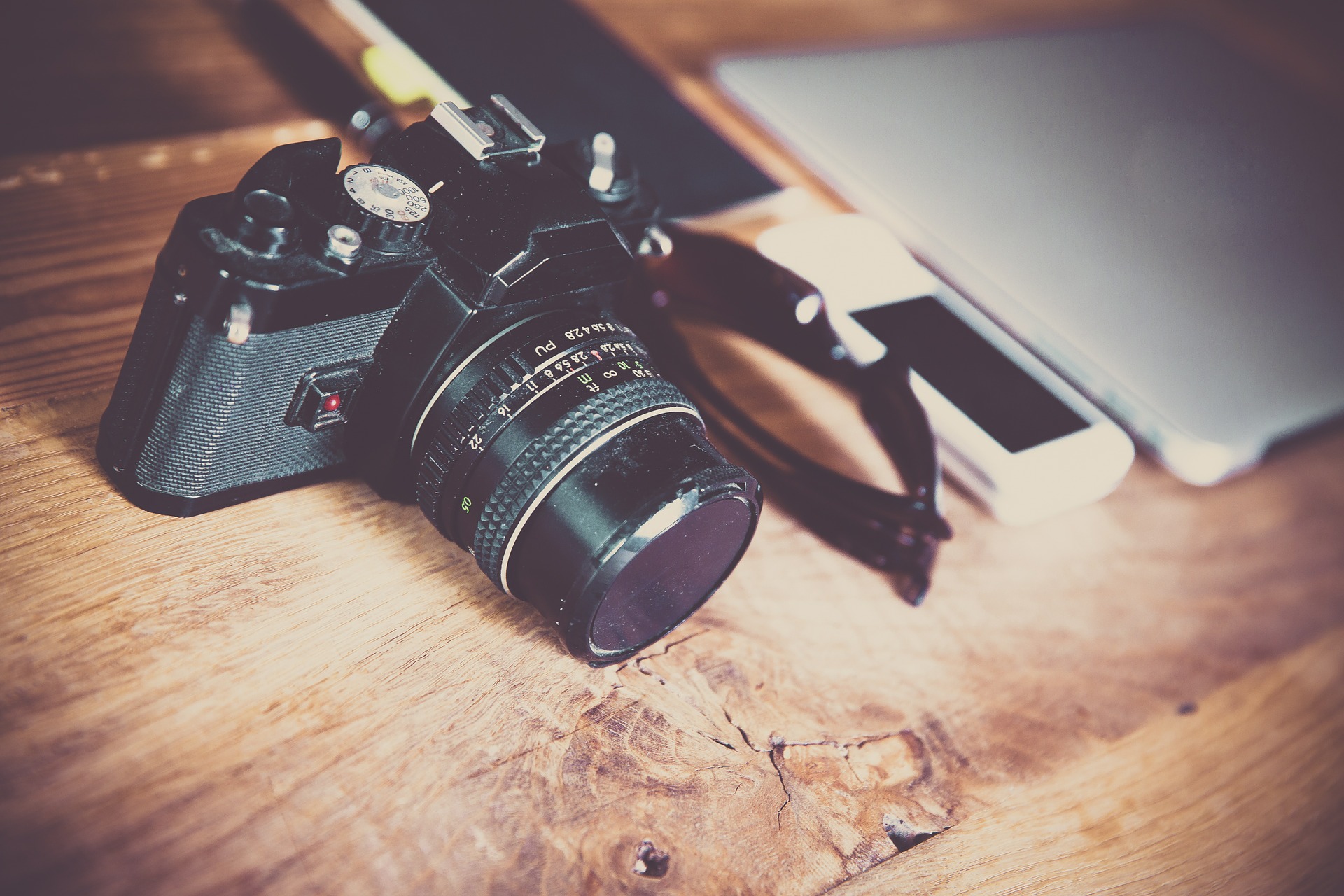 camera on wooden table