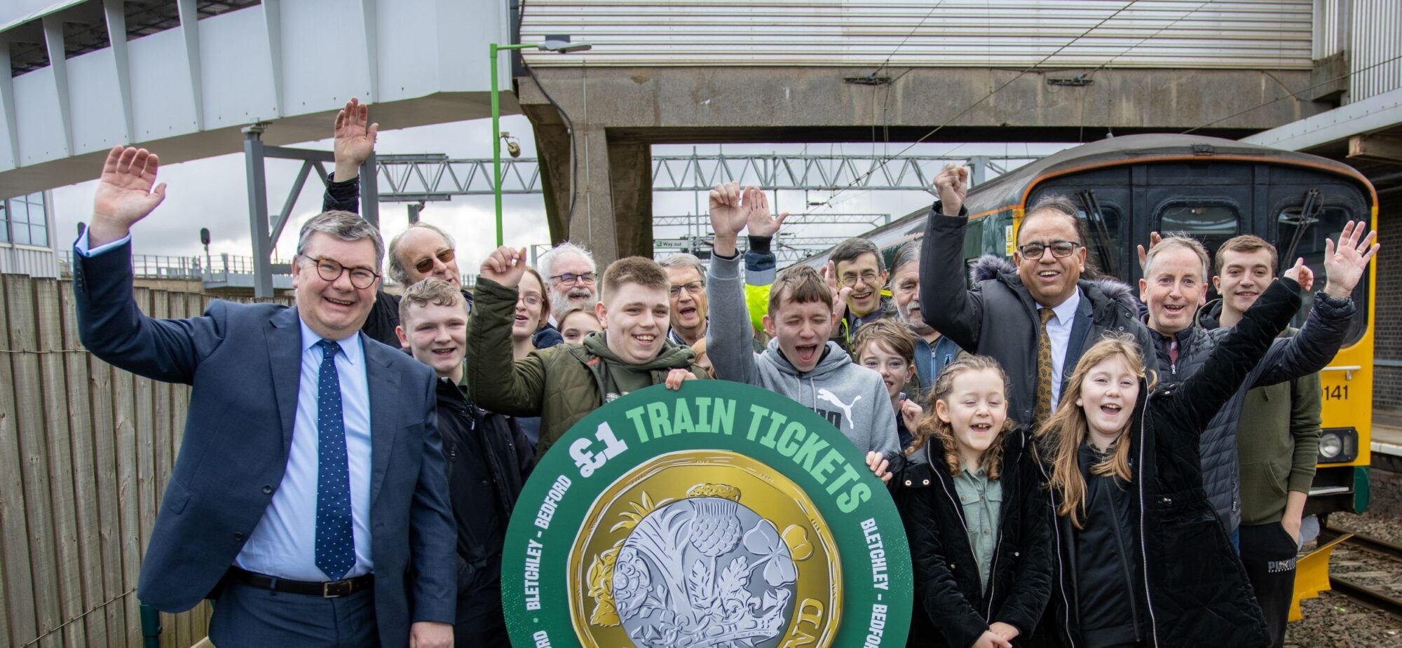 Iain Stewart Mohammad Yasin Mp With Passengers On Platform (002)
